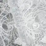 Тюль в спальню с белой вышивкой