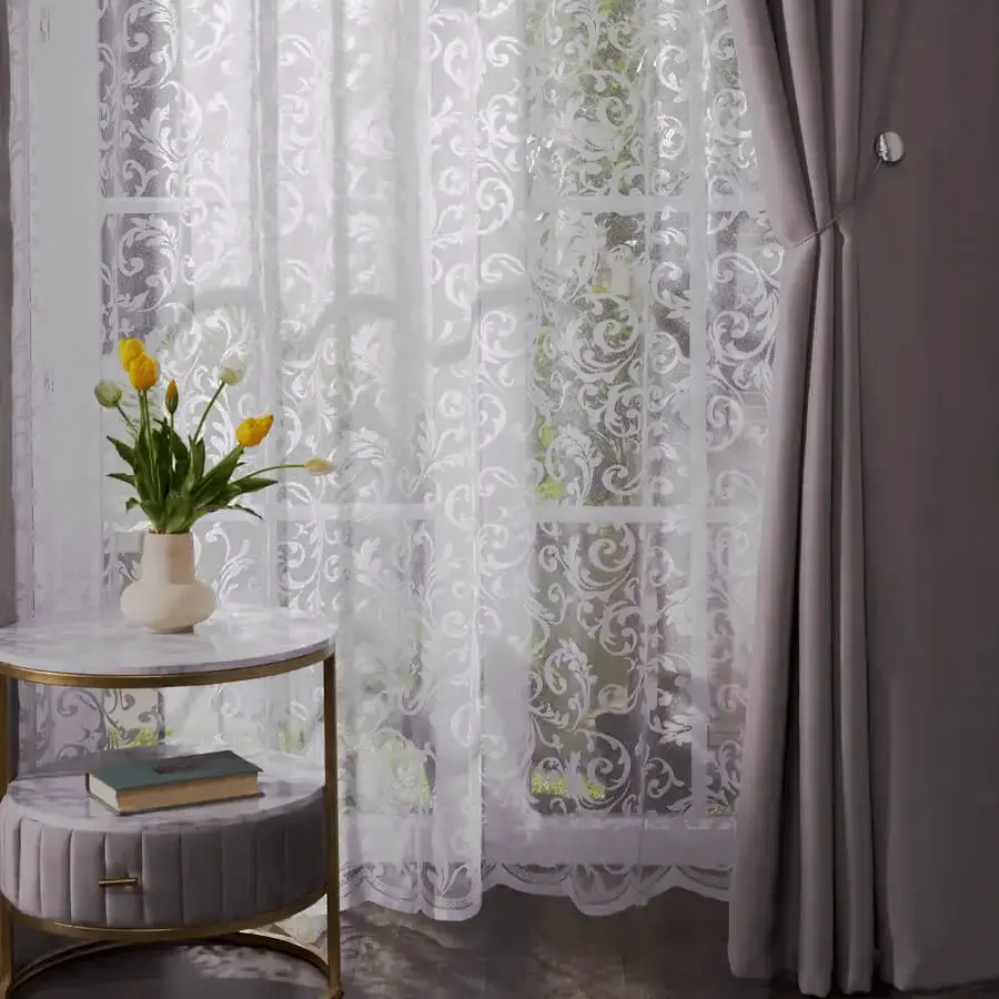 тюль с вензелем Mariano на окне в интерьере