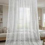 тюль с рисунком волны на окне